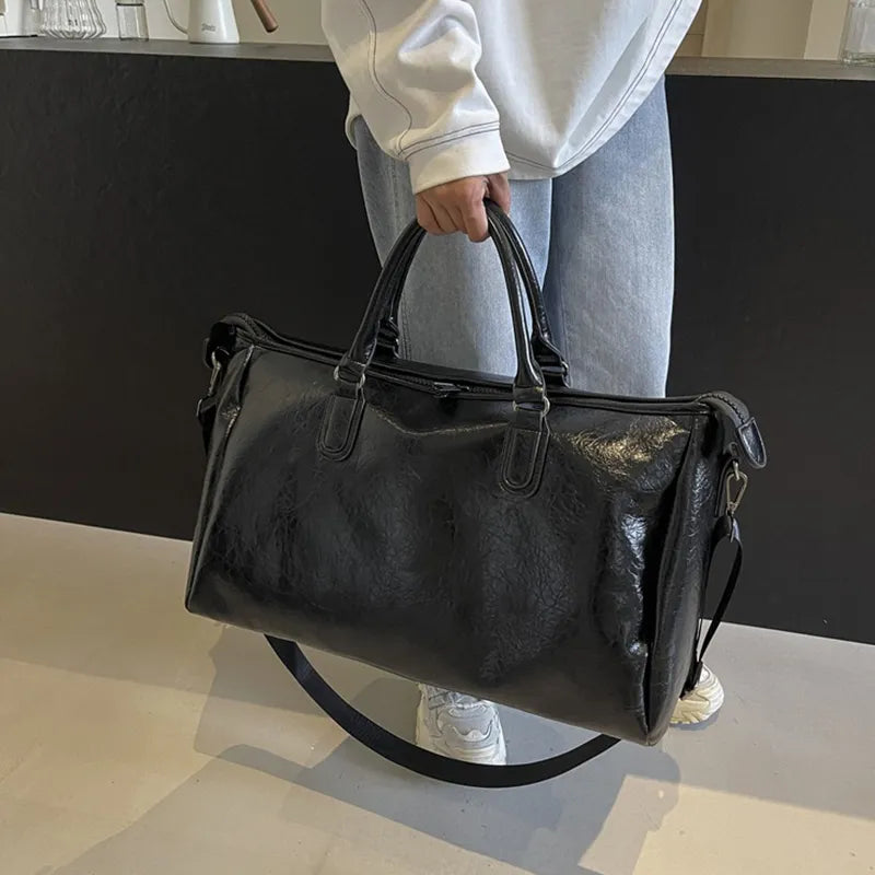 PAKLET Studio – stor rejsetaske i kunstlæder